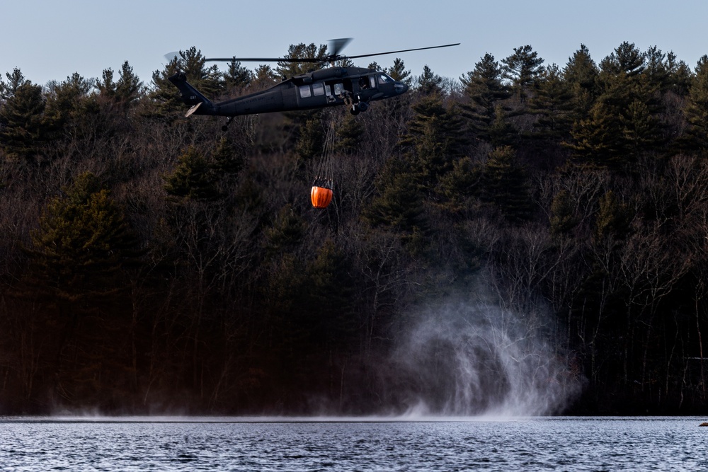 Rhode Island Army National Guard conducts UH-60 BAMBI Bucket training on 3 March 2023.