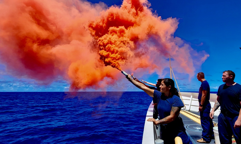 U.S. Coast Guard members conduct pyrotechnic training