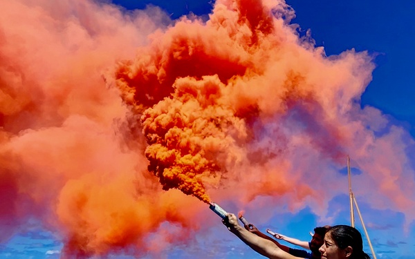 U.S. Coast Guard members conduct pyrotechnic training