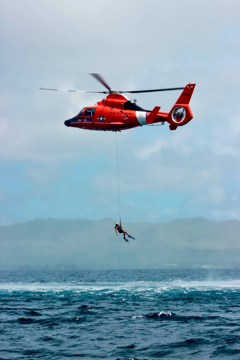 U.S. Coast Guard Dolphin helicopter crew trains in Guam