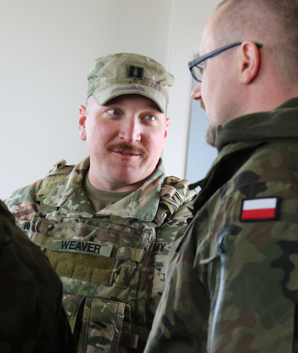 ILLINOIS NATIONAL GUARD SOLDIERS RECEIVE POLISH ARMED FORCES MEDAL