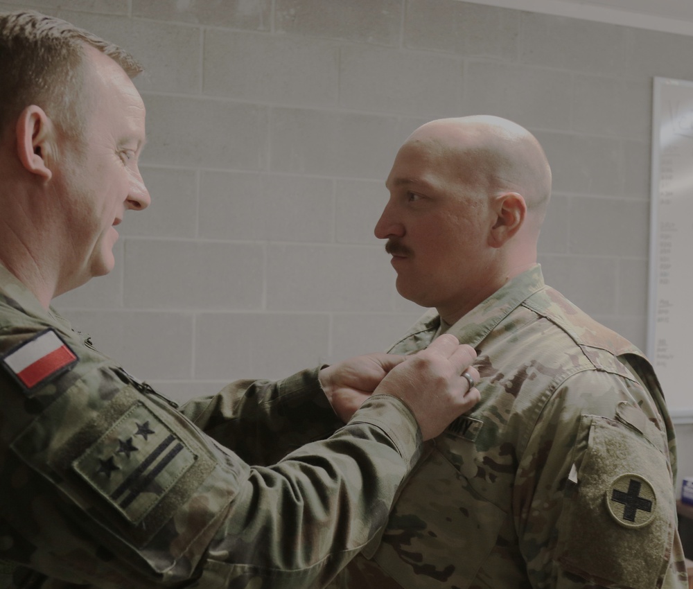 ILLINOIS NATIONAL GUARD SOLDIERS RECEIVE POLISH ARMED FORCES MEDAL