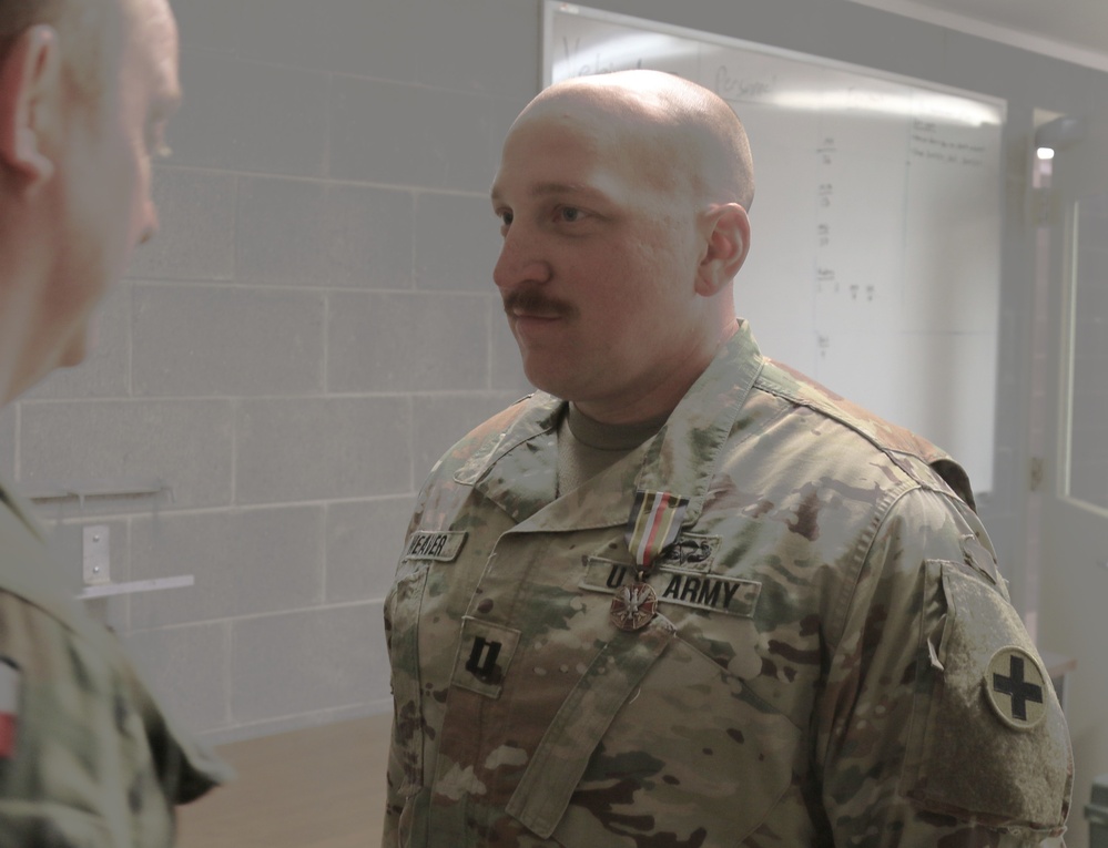 ILLINOIS NATIONAL GUARD SOLDIERS RECEIVE POLISH ARMED FORCES MEDAL