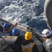 USS Thomas Hudner (DDG 116) conducts a replenishment at sea