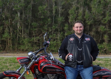 NSWC Dam Neck Activity employee is a teddy bear-hugging biker for a good cause