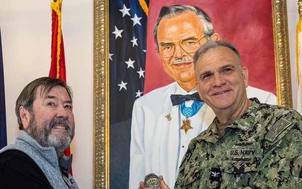 The family of Robert E. Bush visits the Robert E. Bush Naval hospital