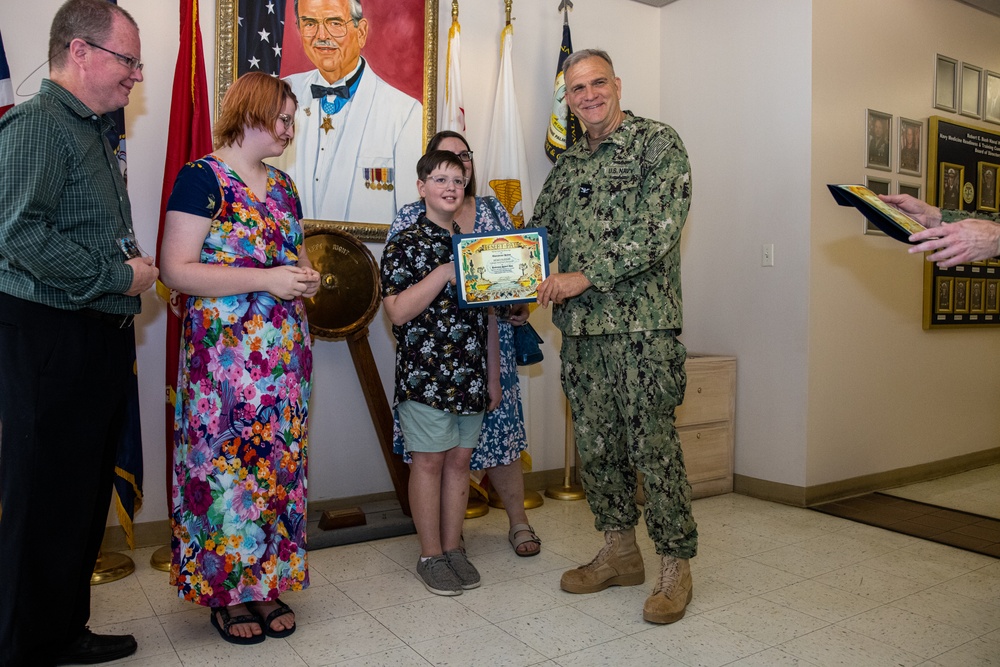 The family of Robert E. Bush visits the Robert E. Bush Naval hospital