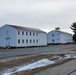 Contractors prepare second round of World War II-era barracks buildings to be moved at Fort McCoy