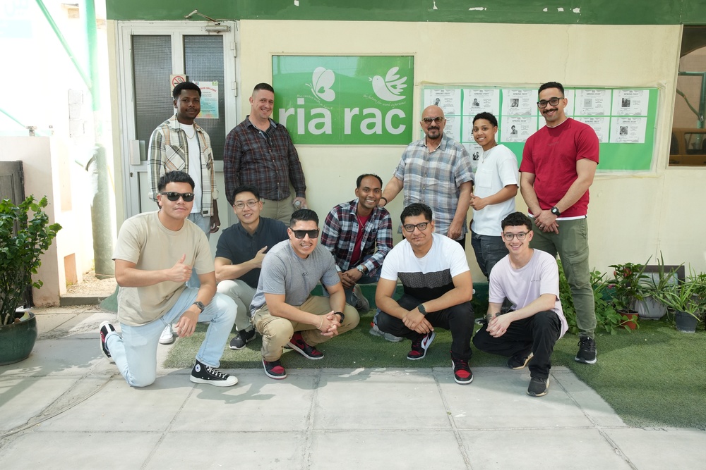 Marines with TF 51/5 volunteer at a local school in Bahrain