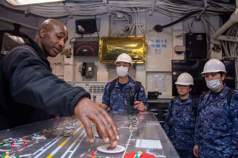USS Ronald Reagan (CVN 76) Sailors host tour for members of JMSDF