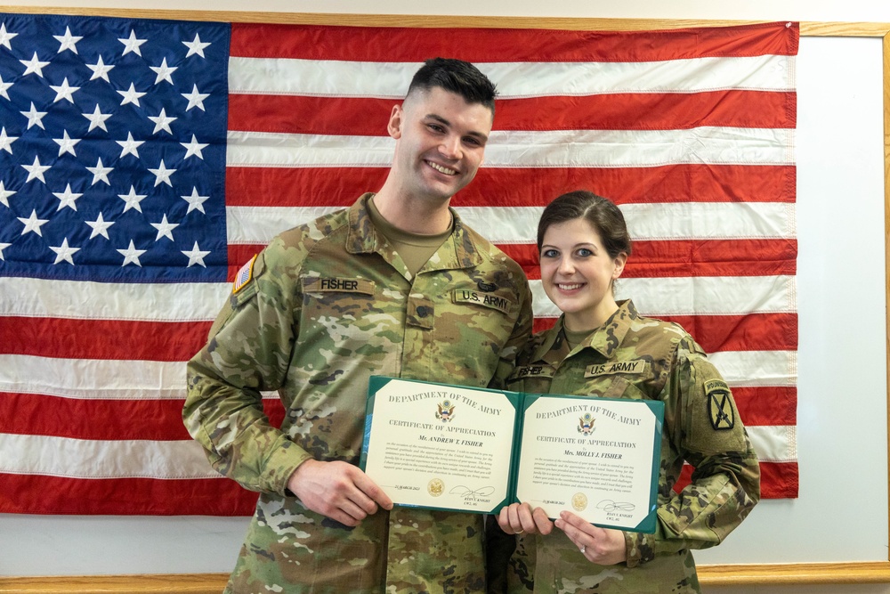 Two army band soldiers marry and reenlist together