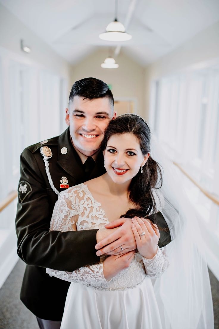 Two army band soldiers marry and reenlist together