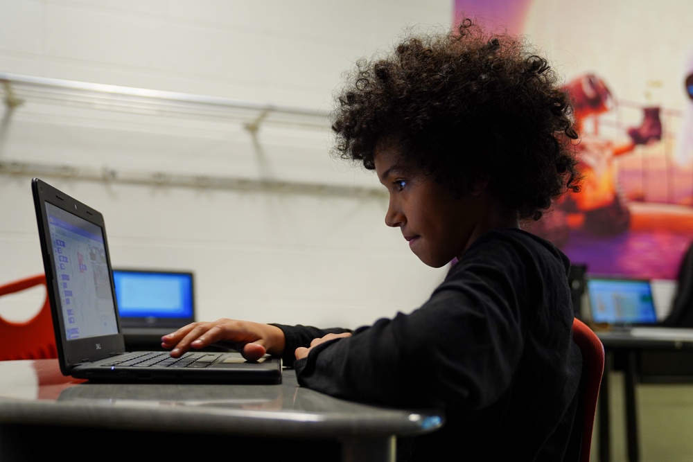 336th TRS instructors teach local 4th grade students programming
