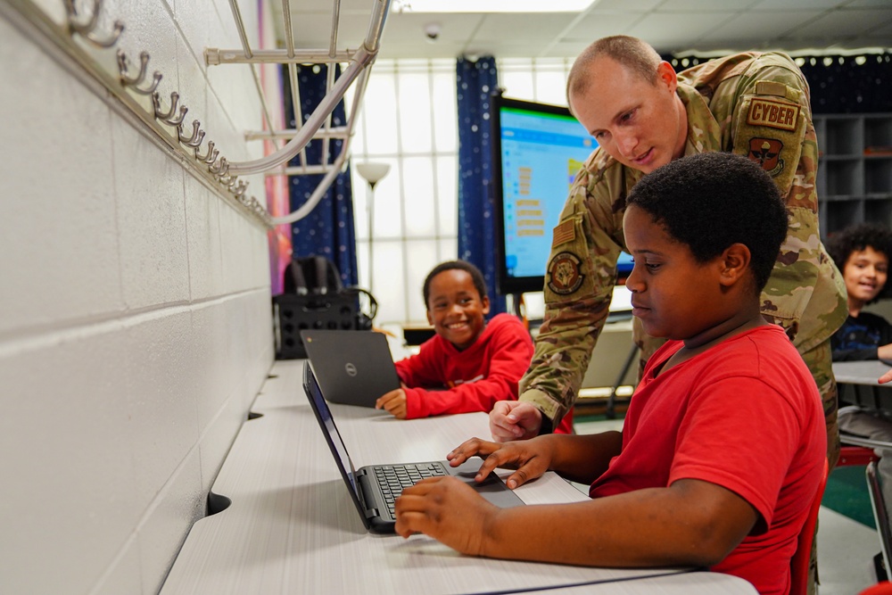 336th TRS instructors teach local 4th grade students programming