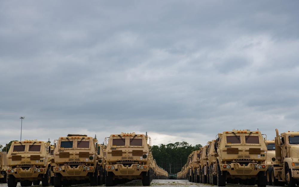 U.S. Army vehicles are loaded onto the USNS Pomeroy