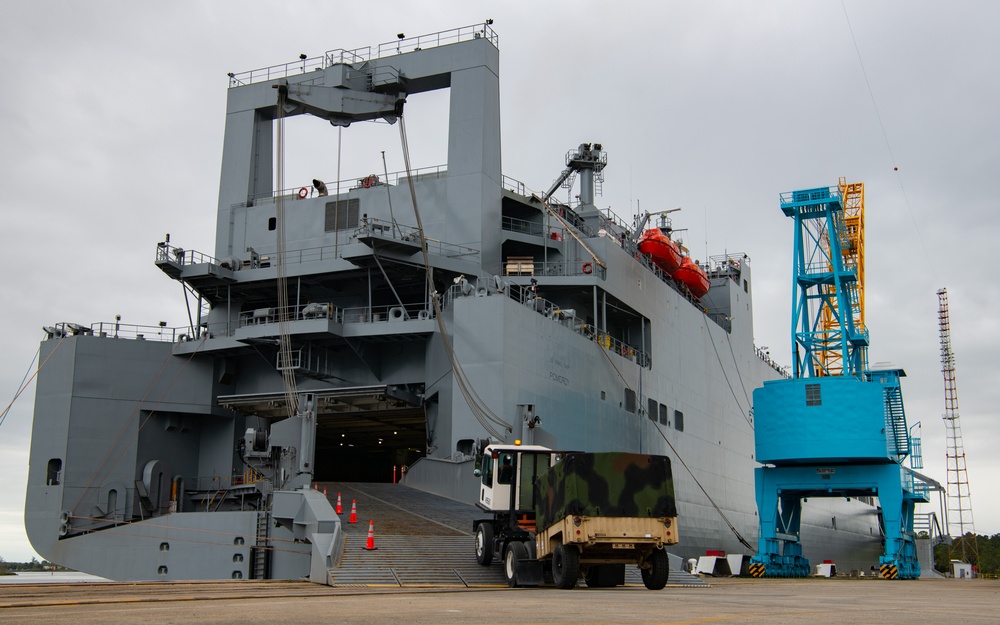 U.S. Army vehicles are loaded onto the USNS Pomeroy