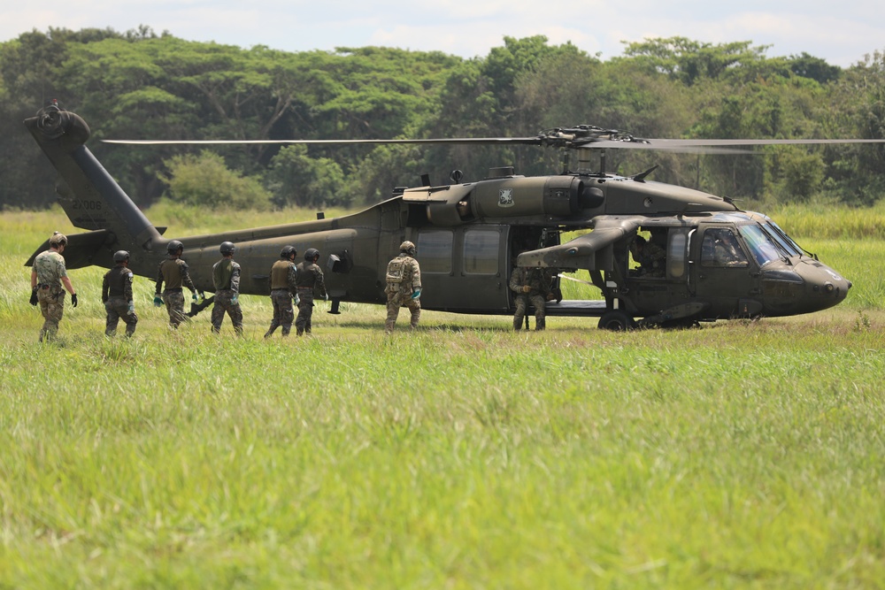 Navy SEALs conduct Fast Rope Insertion/Extraction System (FRIES) training with Guatemalan Naval Special Forces