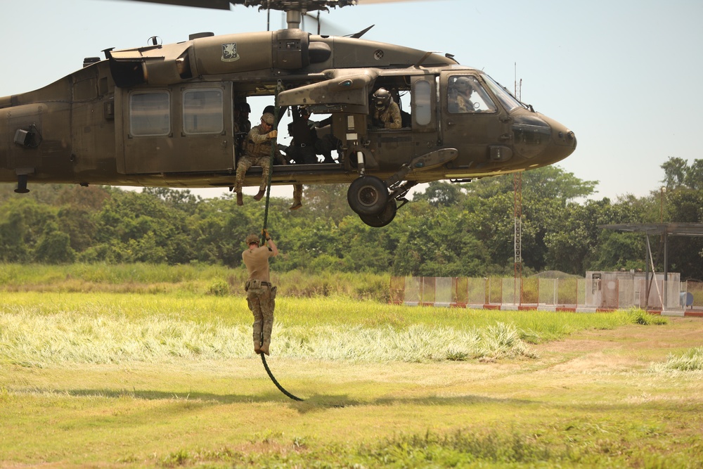 Navy SEALs conduct Fast Rope Insertion/Extraction System (FRIES) training with Guatemalan Naval Special Forces