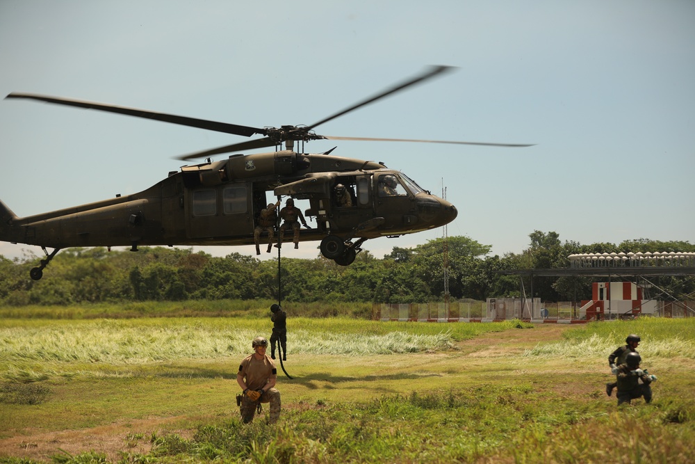 Navy SEALs conduct Fast Rope Insertion/Extraction System (FRIES) training with Guatemalan Naval Special Forces