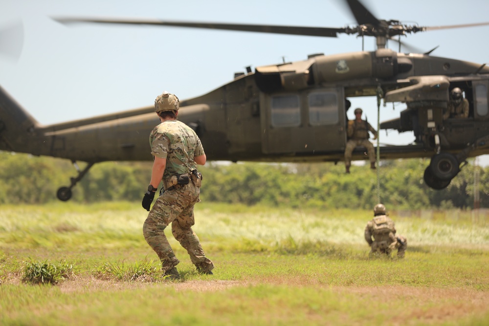 Navy SEALs conduct Fast Rope Insertion/Extraction System (FRIES) training with Guatemalan Naval Special Forces