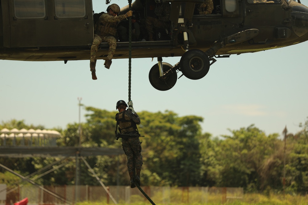 Navy SEALs conduct Fast Rope Insertion/Extraction System (FRIES) training with Guatemalan Naval Special Forces