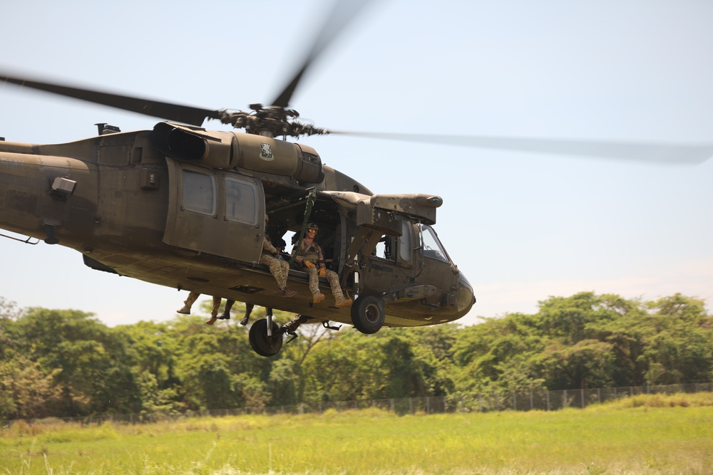 Navy SEALs conduct Fast Rope Insertion/Extraction System (FRIES) training with Guatemalan Naval Special Forces