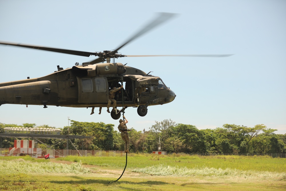 Navy SEALs conduct Fast Rope Insertion/Extraction System (FRIES) training with Guatemalan Naval Special Forces