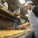 Culinary Specialist Flips Naan