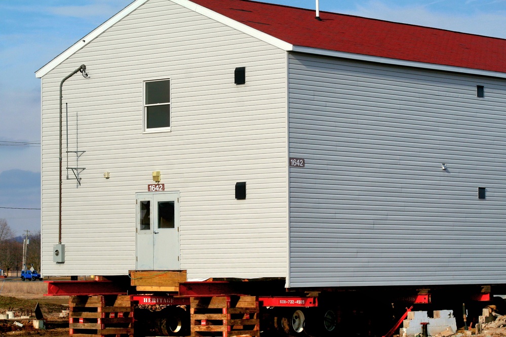 Contractors prepare second round of World War II-era barracks buildings to be moved at Fort McCoy