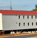 Contractors prepare second round of World War II-era barracks buildings to be moved at Fort McCoy