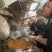 Culinary Specialist Pours Flour