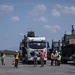 Marines, Soldiers, Airmen, and Filipino Civilians work together to send out equipment in preparation for Balikatan 23