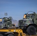 Marines, Soldiers, Airmen, and Filipino Civilians work together to send out equipment in preparation for Balikatan 23