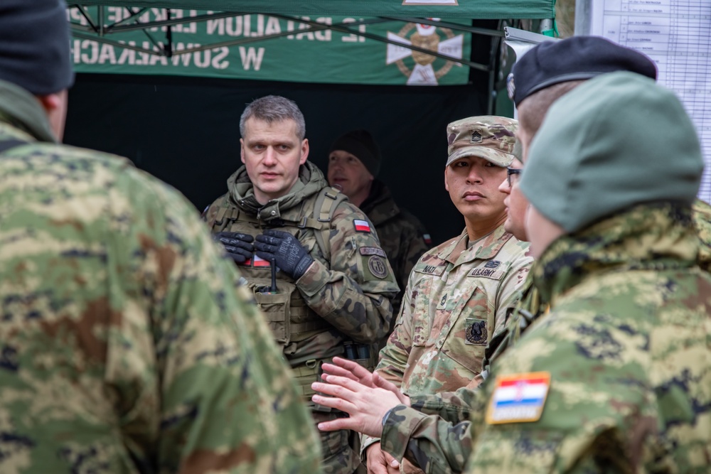 EFP Battle Group Poland Marksman Take Aim During Competition