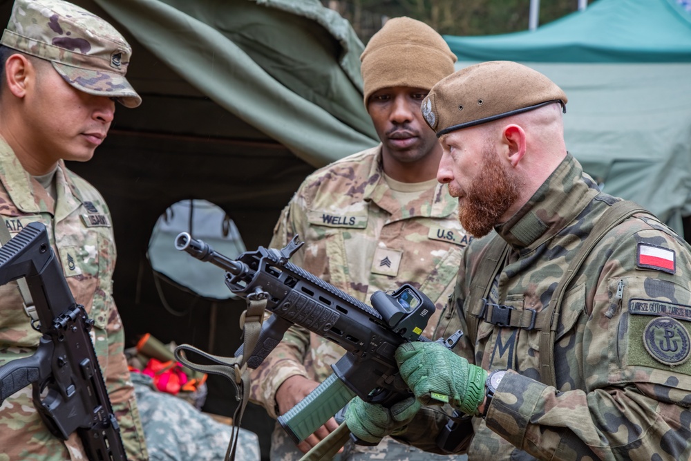 EFP Battle Group Poland Marksman Take Aim During Competition