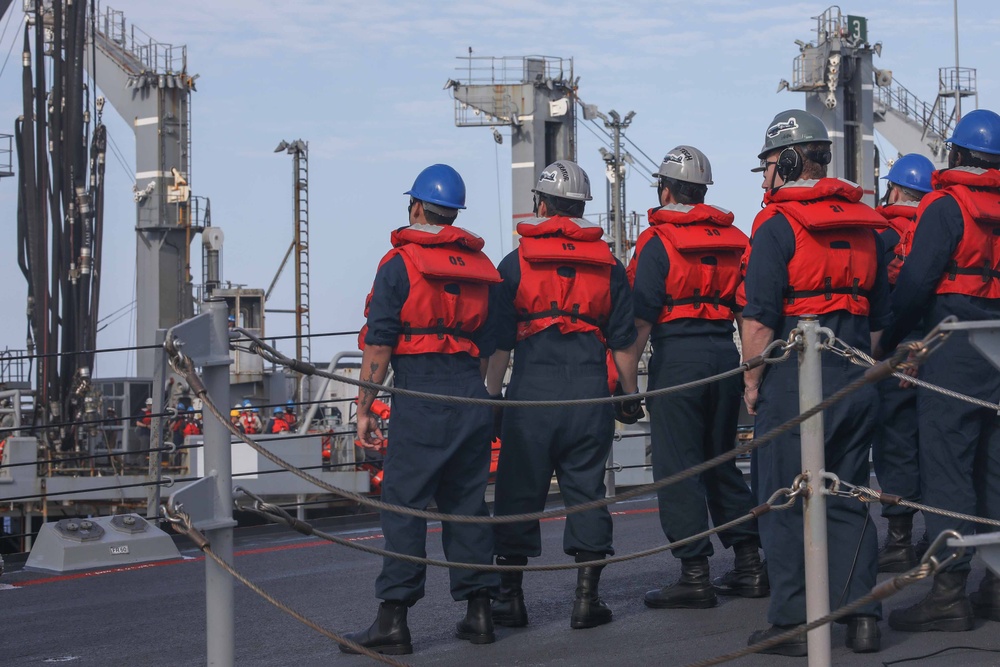 USS Thomas Hudner (DDG 116) conducts a replenishment at sea