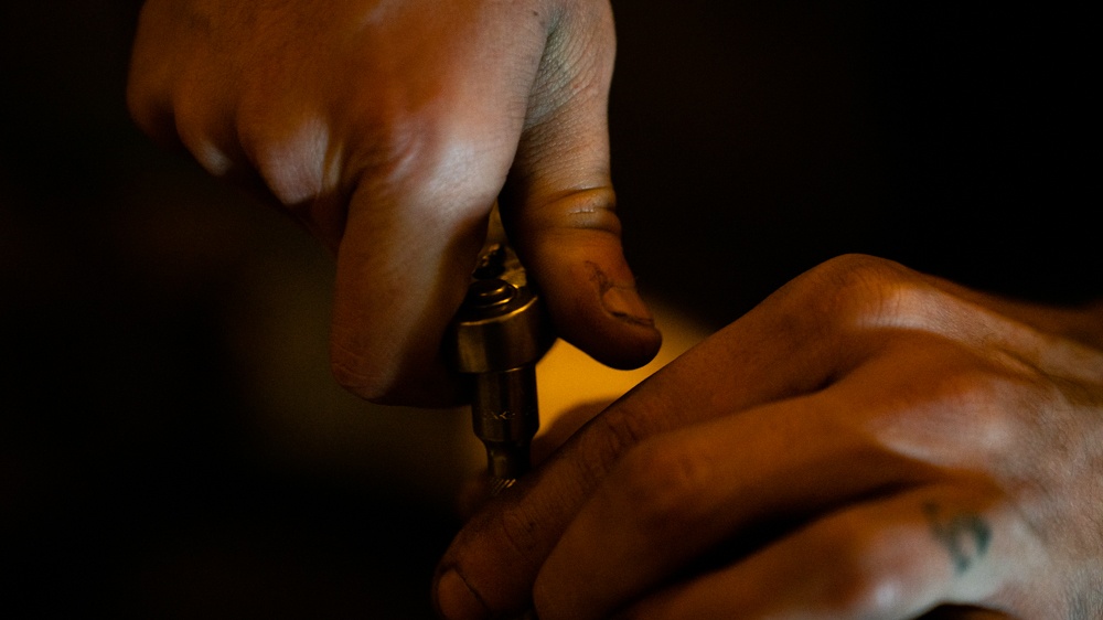 HSC 4 Sailor Conducts Maintenance aboard USS Carl Vinson (CVN 70)