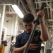 Sailor aboard USS Ramage (DDG 61) in the ship’s forward gym