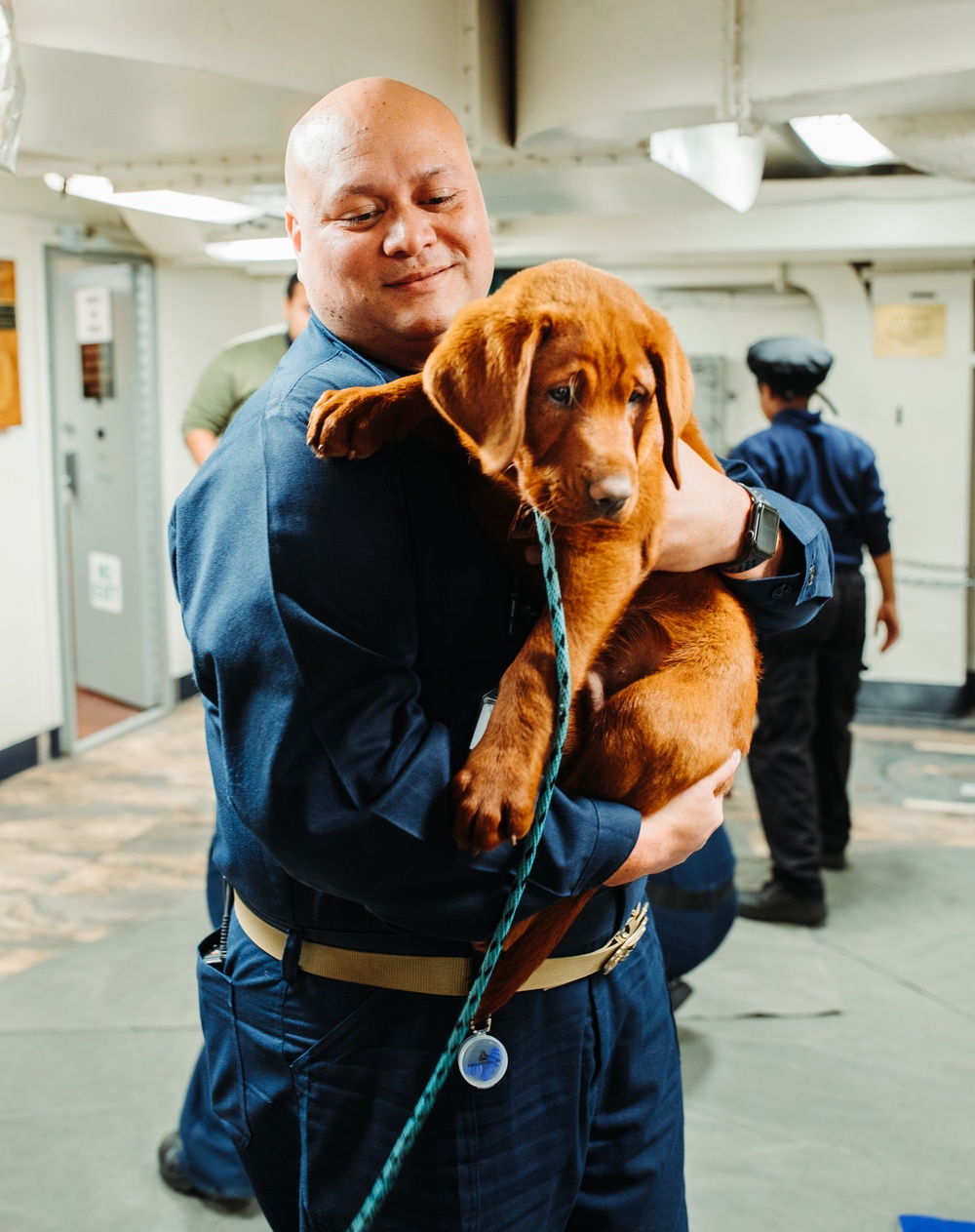Mutts With a Mission Visit Sailors aboard George Washington