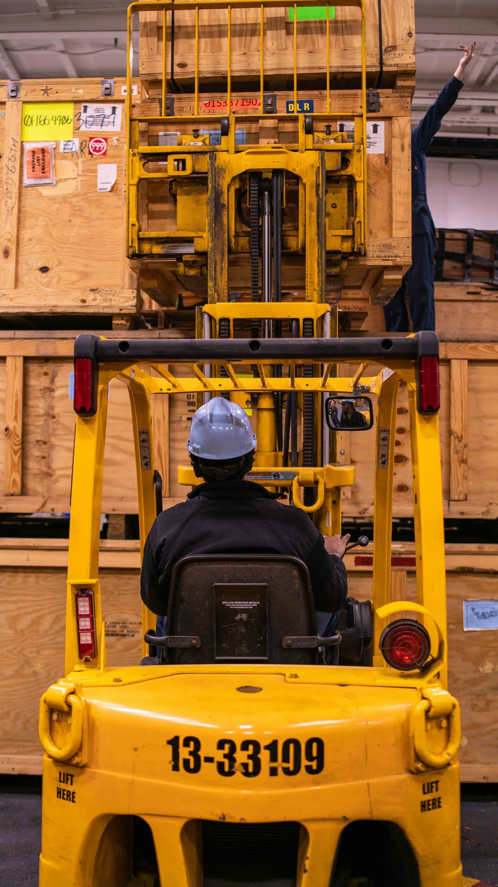 USS Carl Vinson (CVN 70) Sailor Conducts Forklift Operations