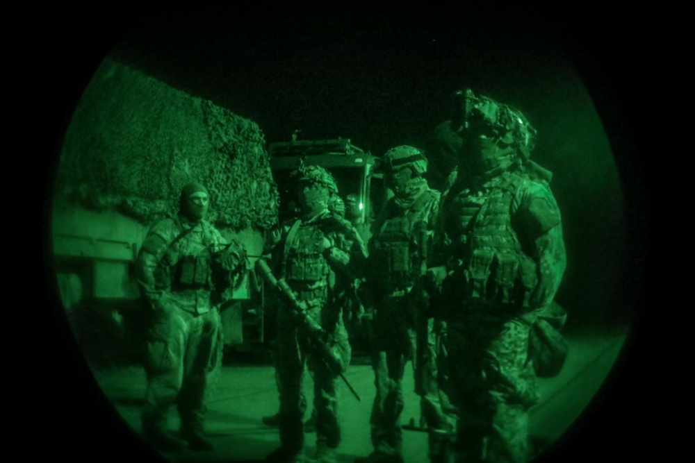 Latvia soldiers Conduct Night Mission During Crystal Arrow