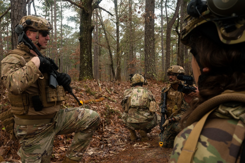 COMCAM briefs for an exercise combat scenario