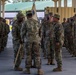 First Sergeants pass 135th Quartermaster Company guidon in ceremony