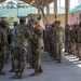 First Sergeants pass 135th Quartermaster Company guidon in ceremony