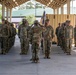 First Sergeants pass 135th Quartermaster Company guidon in ceremony