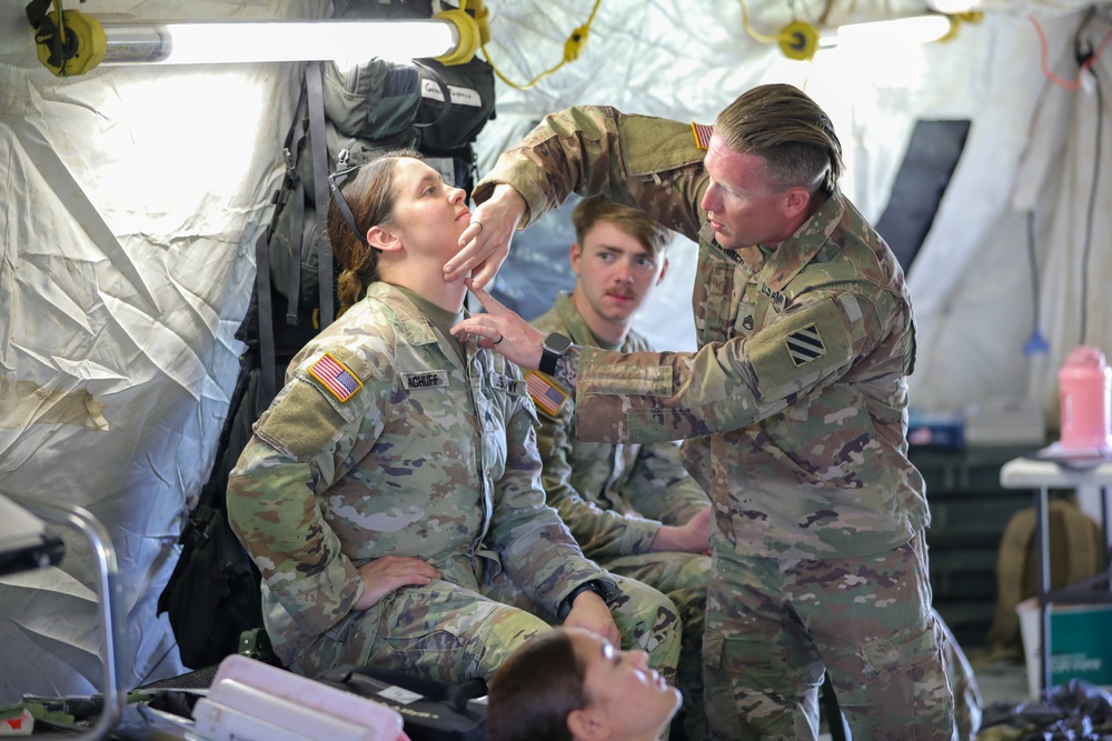 1st Armored Brigade Combat Team Conducts Medical Multilateral Airborne Training