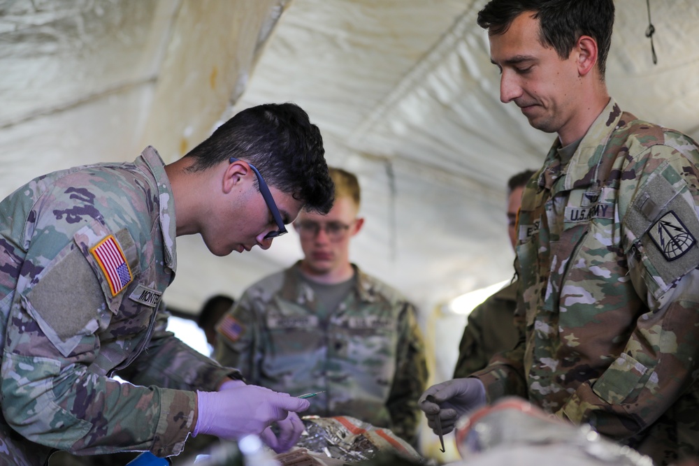 1st Armored Brigade Combat Team Conducts Medical Multilateral Airborne Training