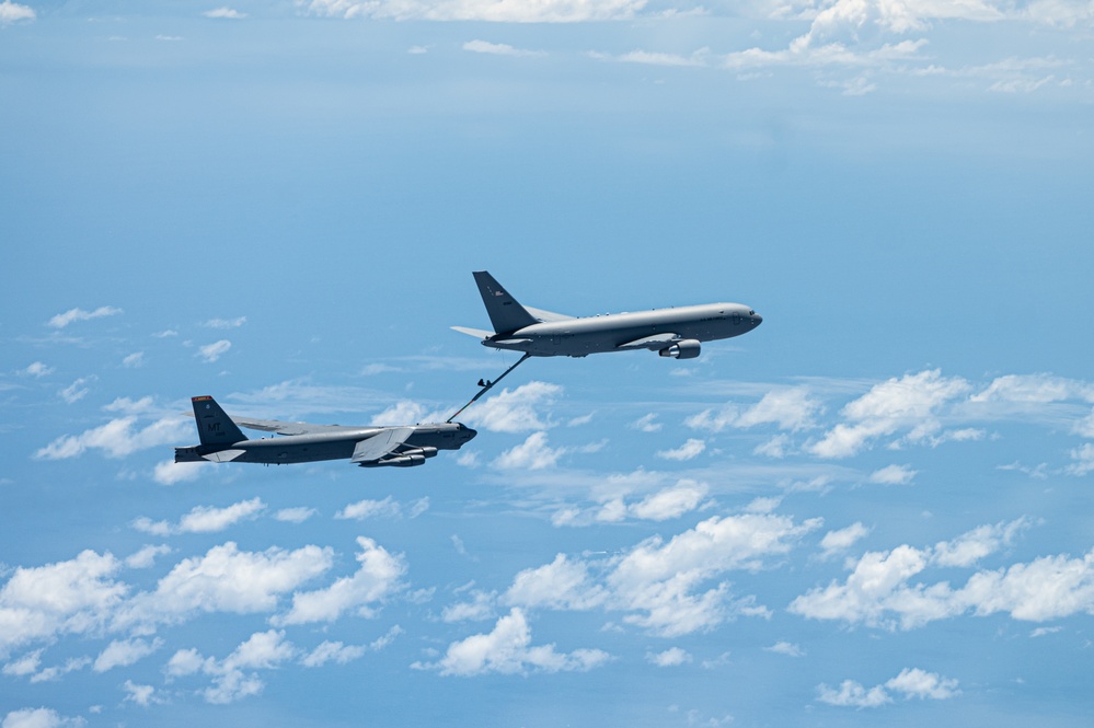 B-52 and KC-46 Aircraft integrate to fly over the Caribbean