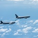 B-52 and KC-46 Aircraft integrate to fly over the Caribbean