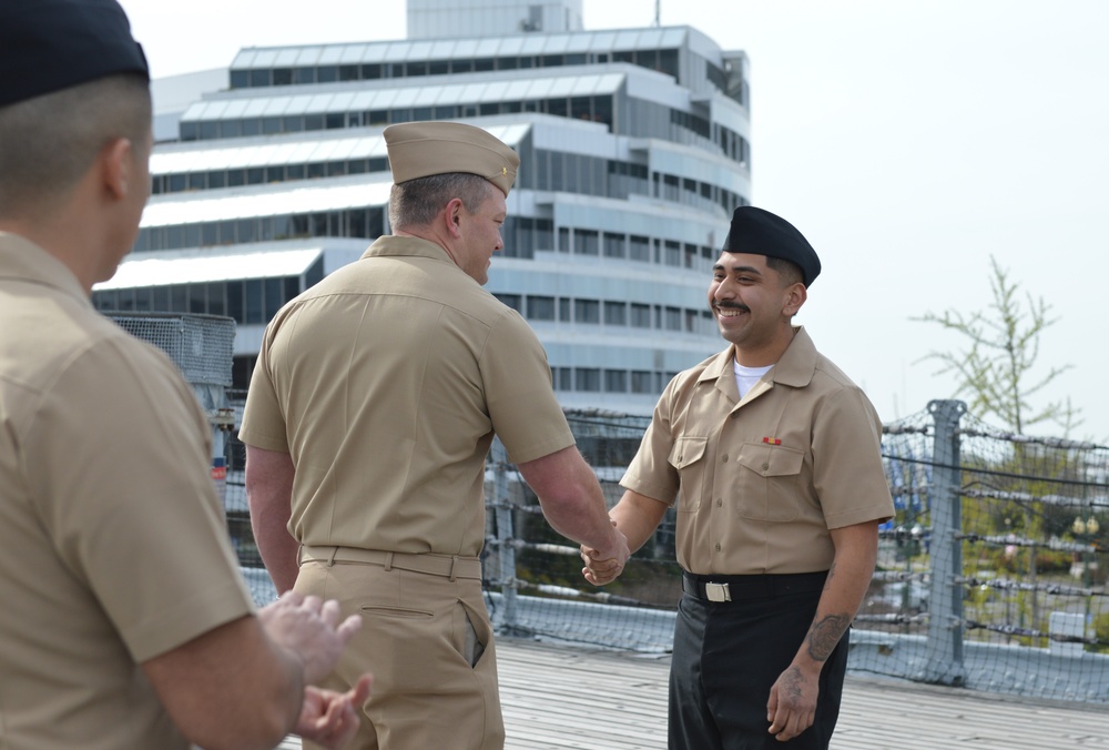 Naval Museum hosts a re-enlistment ceremony aboard Battleship Wisconsin